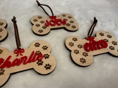 Dog bone ornament - red bow